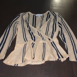 L’academie designer lightly worn cross over sweater